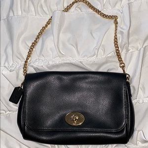 A black Coach purse